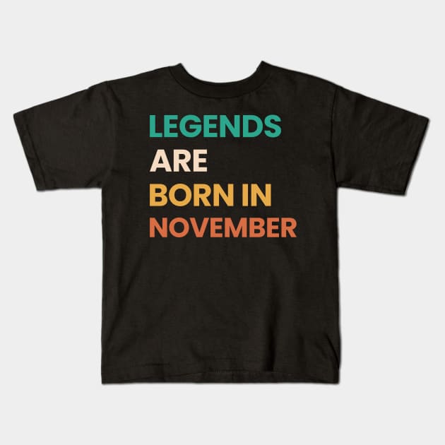 legends are born in november Kids T-Shirt by ezx